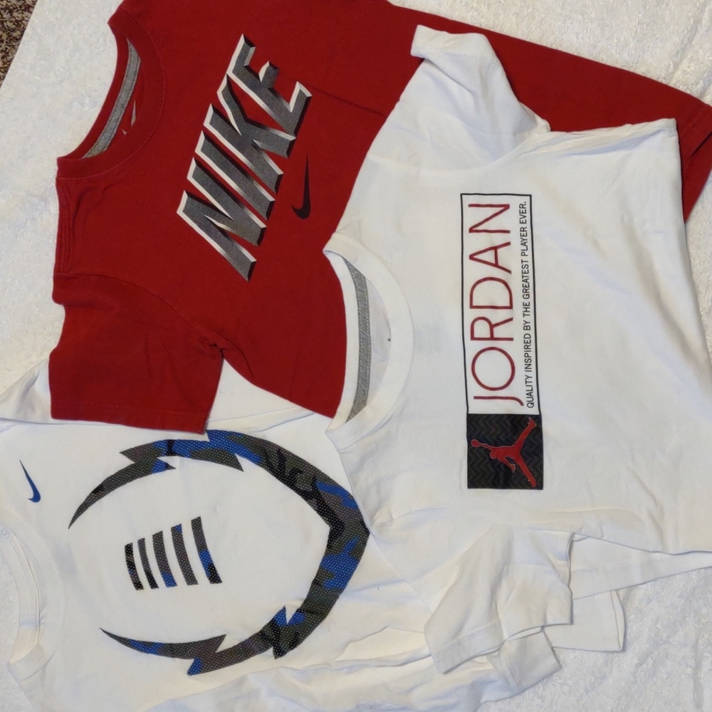 Jordan / Nike bundle.  2 short 1 long sleeve.  Boys size Medium.  Gently used